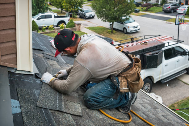 Professional Emergency Roof Repair technician working in Hingham, WI